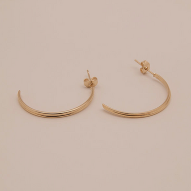 Against M hoop earrings